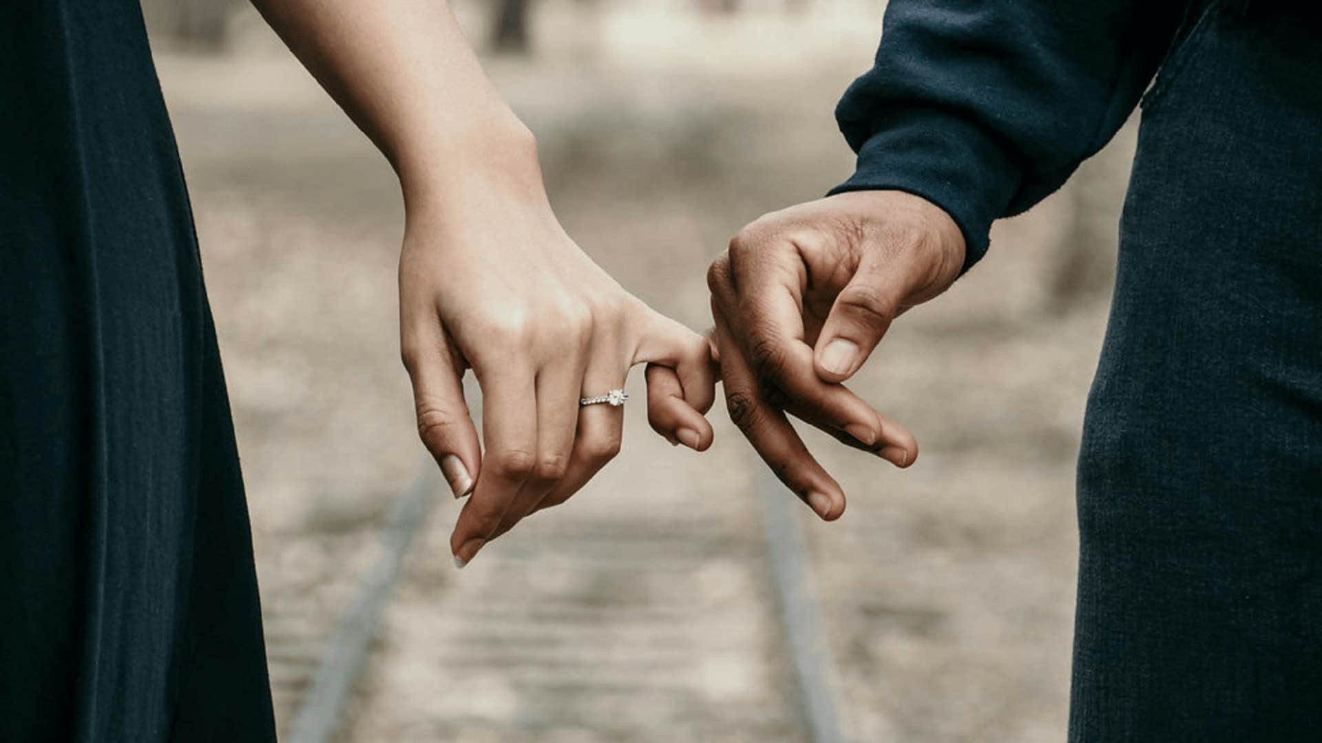 couple wrapping their little fingers