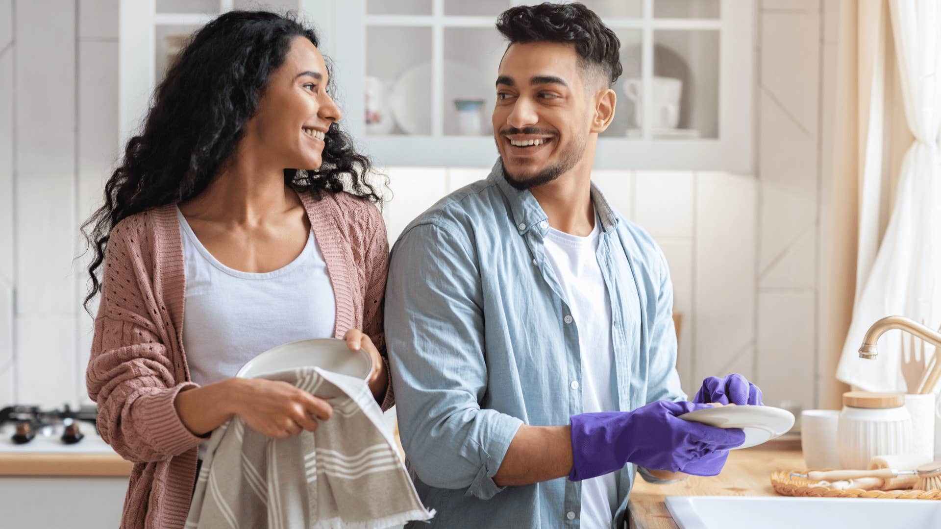 couple doing dishes together