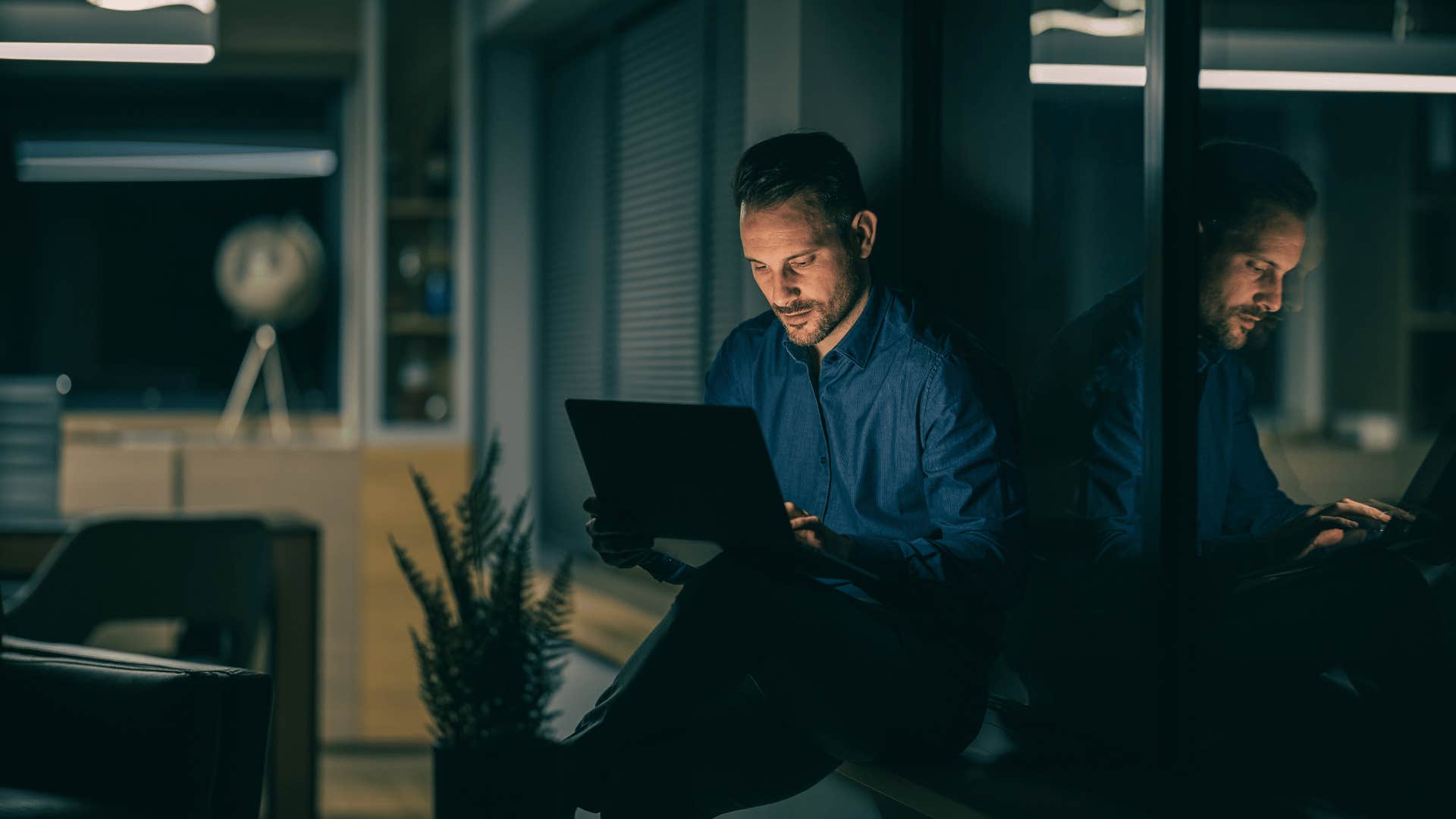 tired employee working late