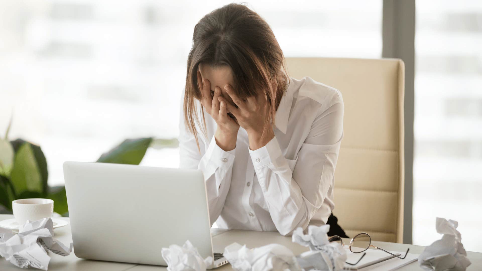 frustrated woman at desk 