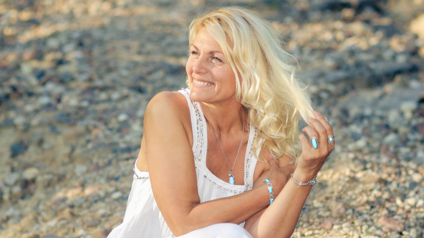 Mother of groom in white sundress