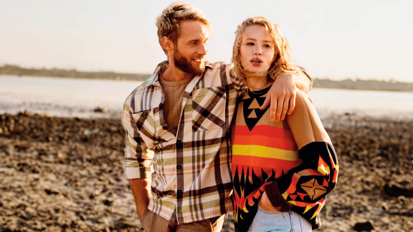 Man looking at partner, while she looks away.