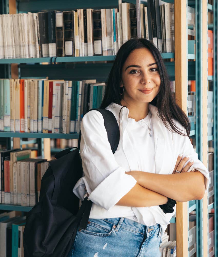 female college student in library