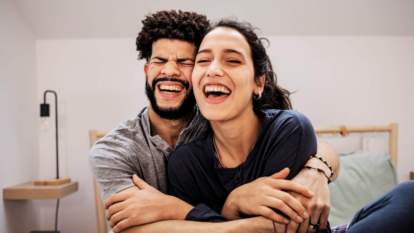 Couple in love smiling and embracing each other