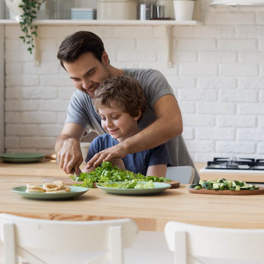 Husband and son making a meal for vegetarian wife