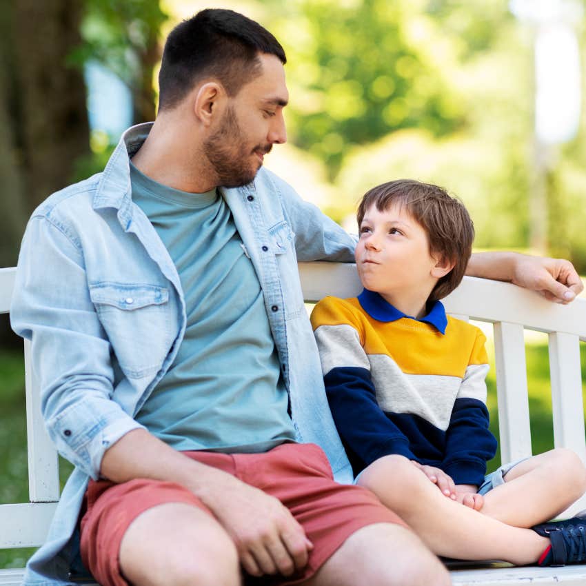 Dad talking to his son to nurture high intelligence. 