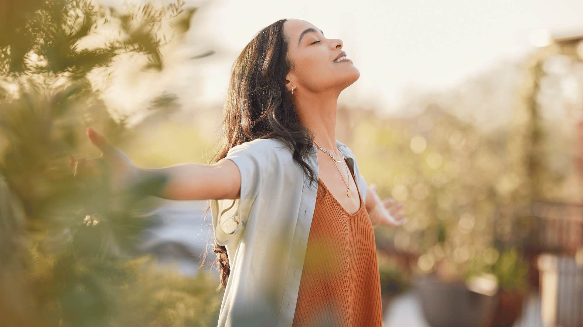 grateful woman standing outside