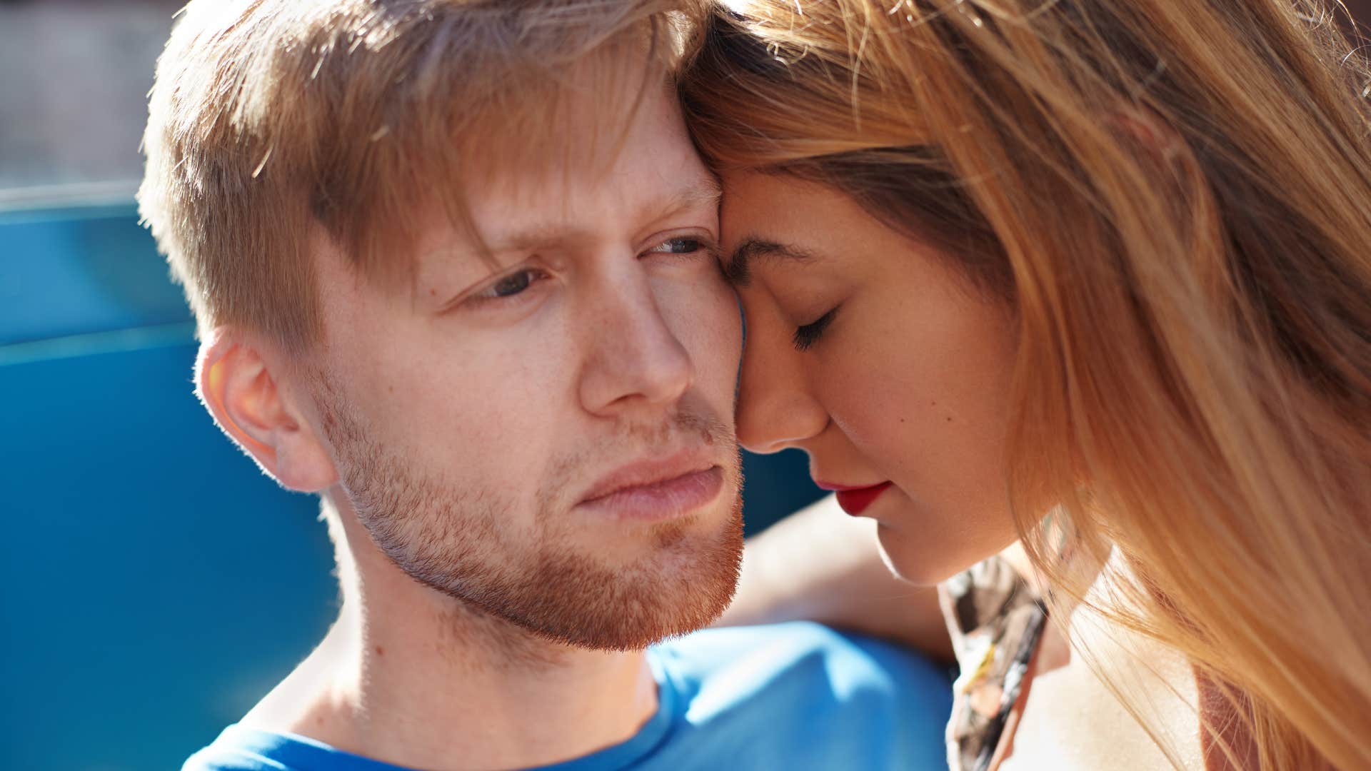 woman looking at her man who is full of red flags