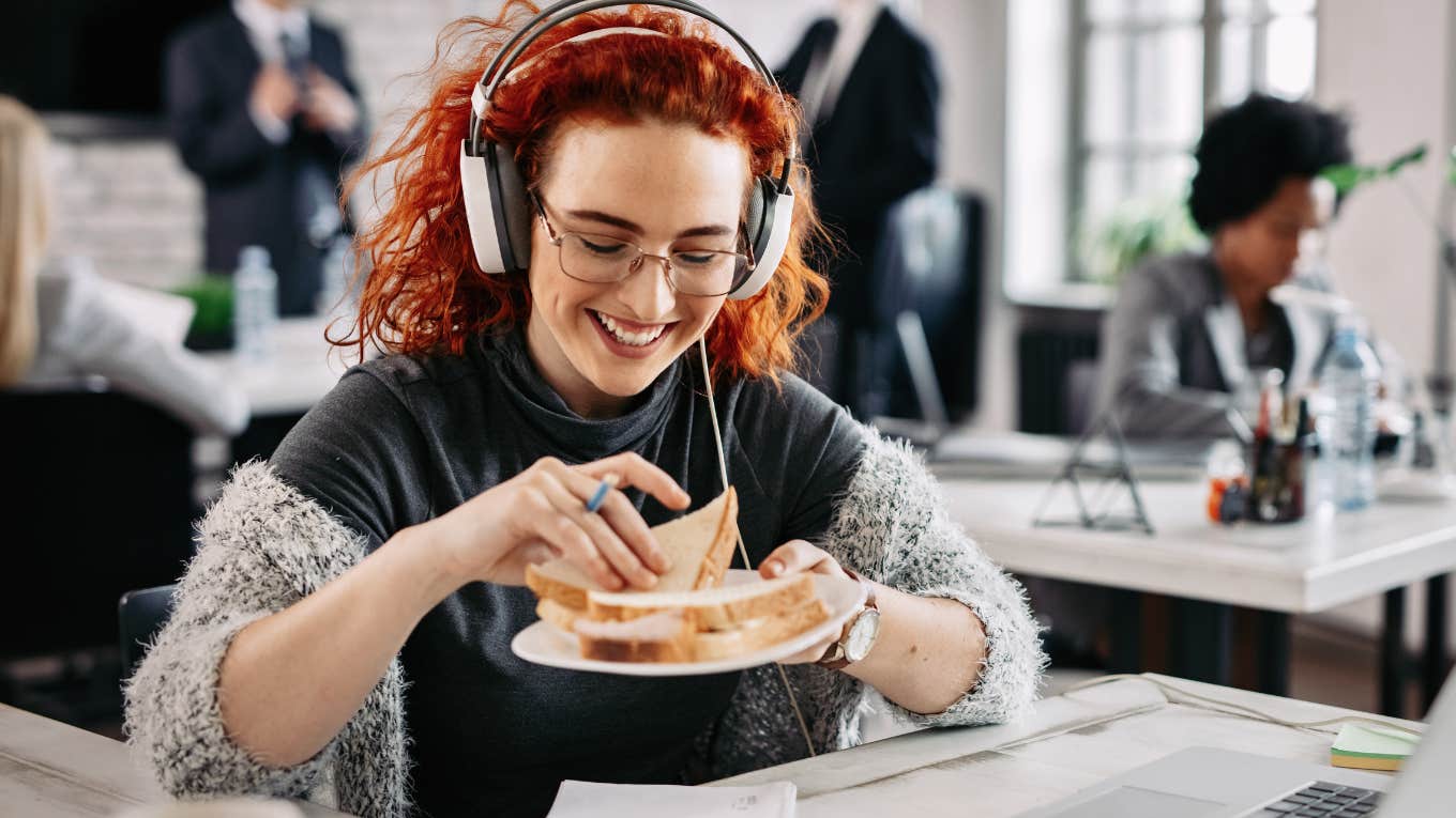 Employee eating a PB&J in her office instead of getting a raise.