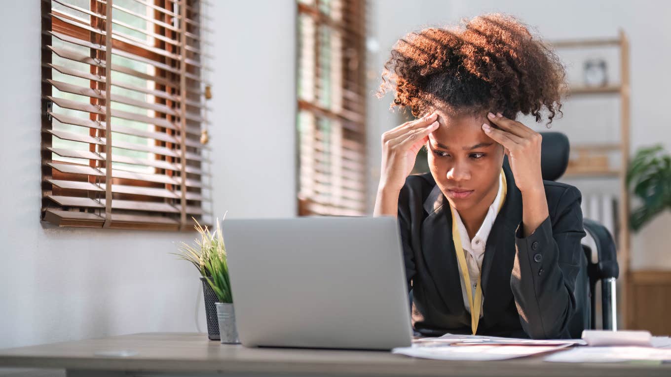 Frustrated worker after getting a promotion with a pay decrease