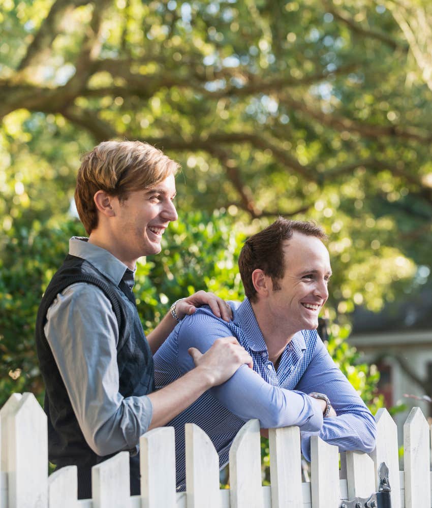 Gay couple in front yard