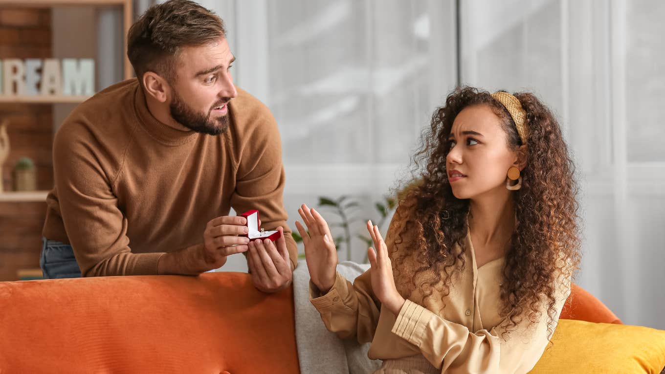 woman turning down boyfriend's marriage proposal