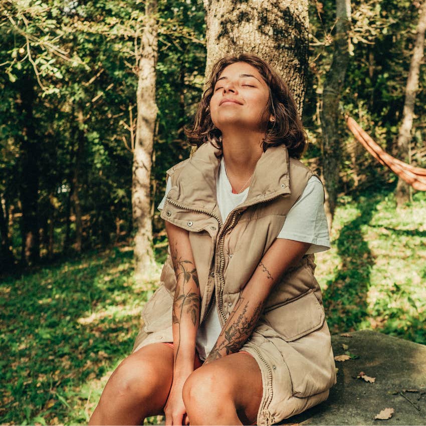 Childless woman relaxing outside in nature. 