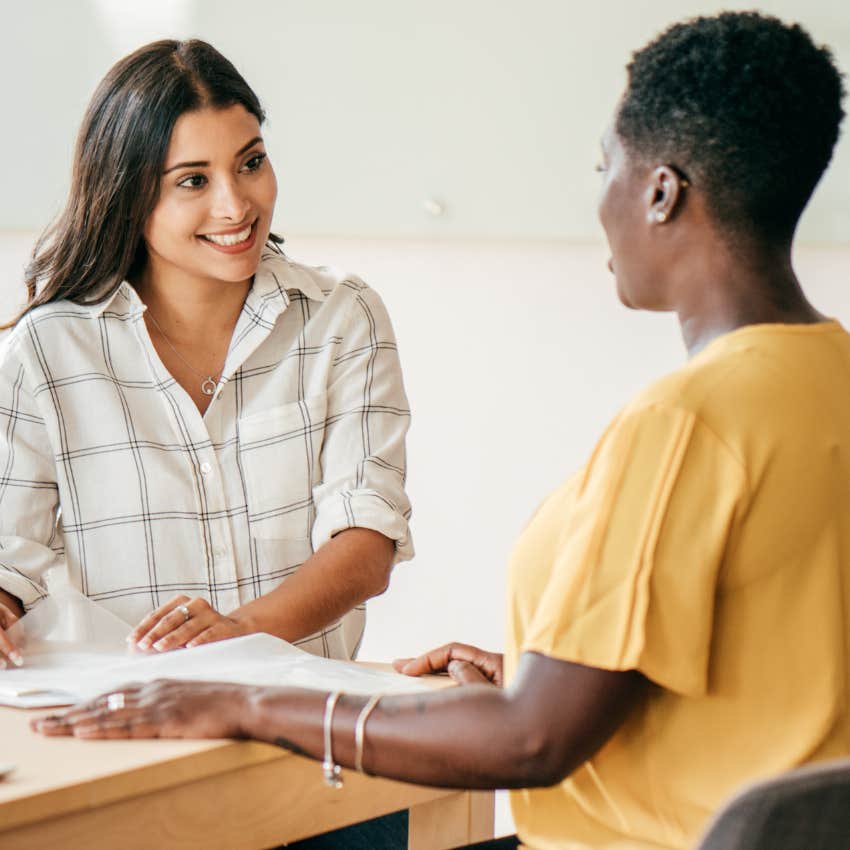 Woman looking happy in a job interview. 