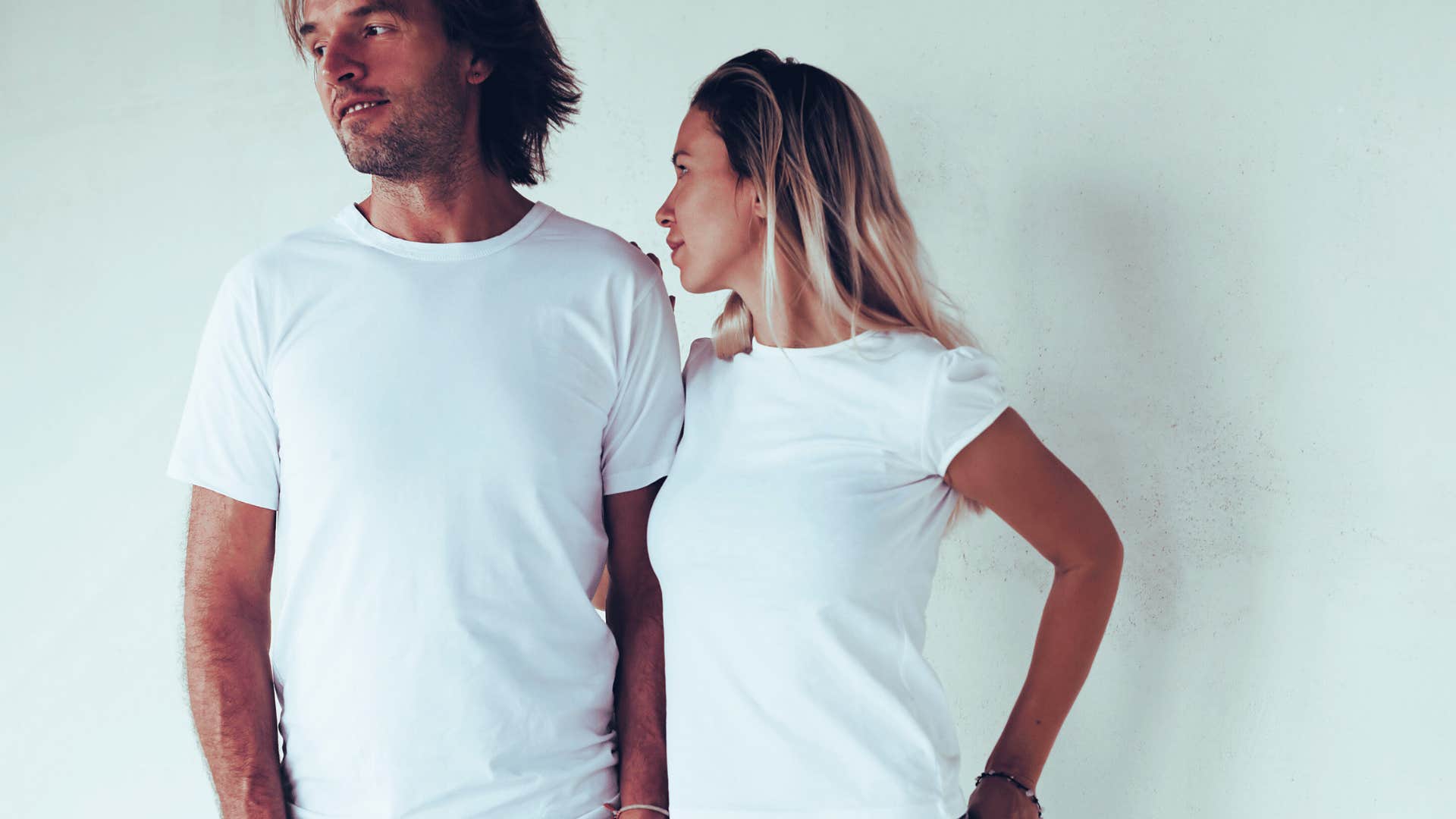 Couple in white tee shirts, dealing with passive aggressive behavior