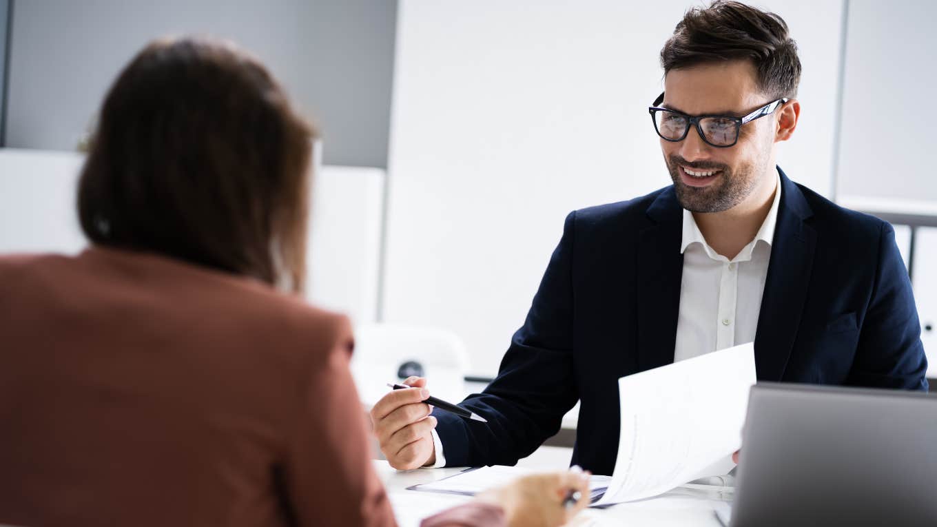 hiring manager talking to prospective job candidate during interview