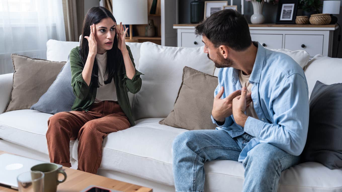 Insecure man arguing with his girlfriend about locking the bathroom door