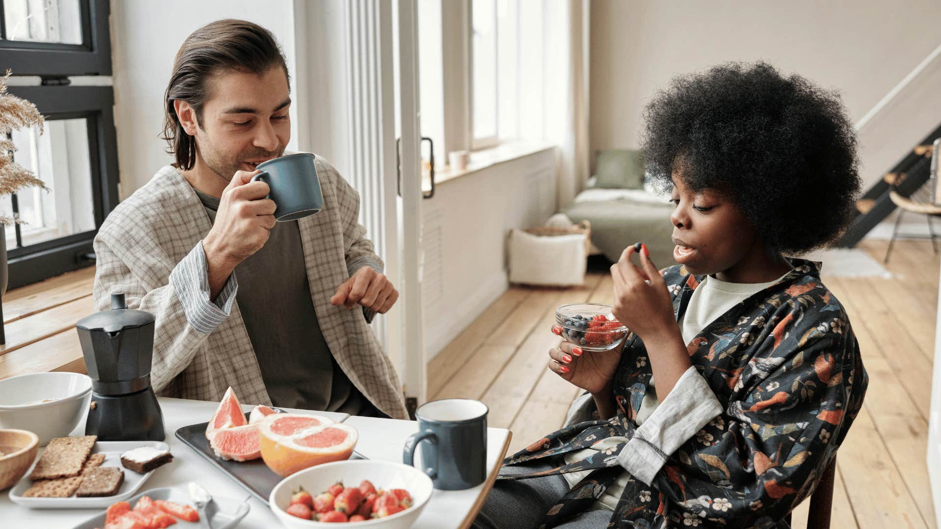 couple talking over healthy breakfast