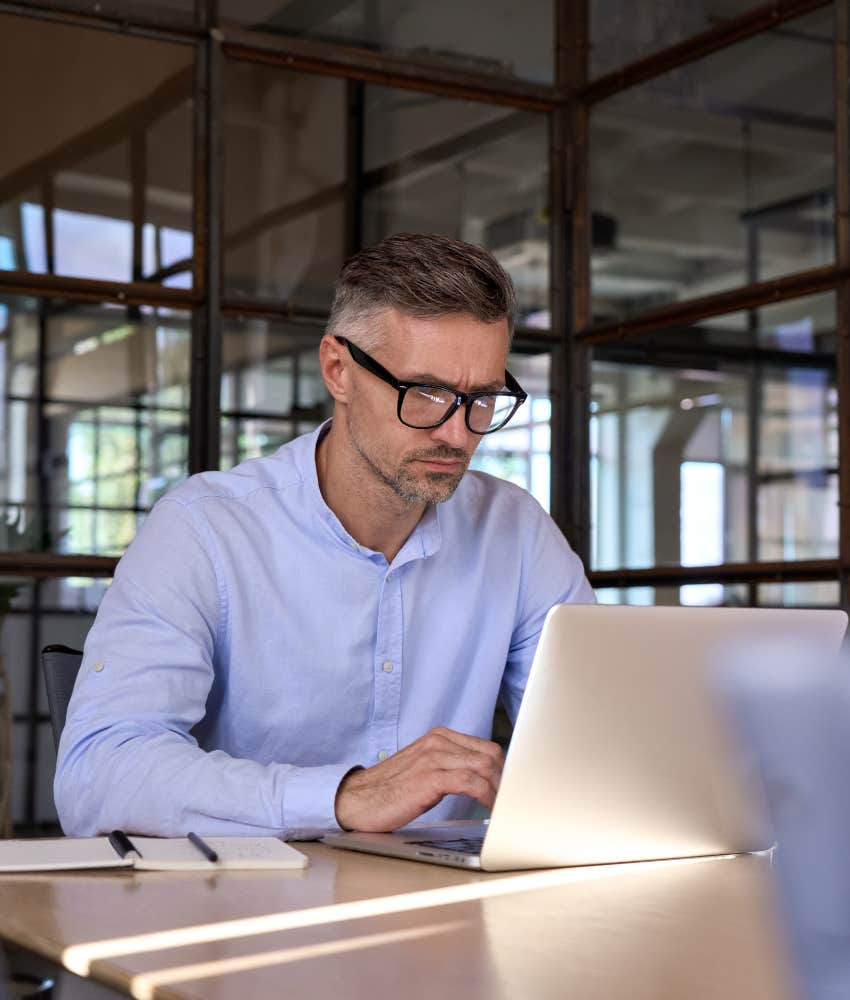 man working on laptop