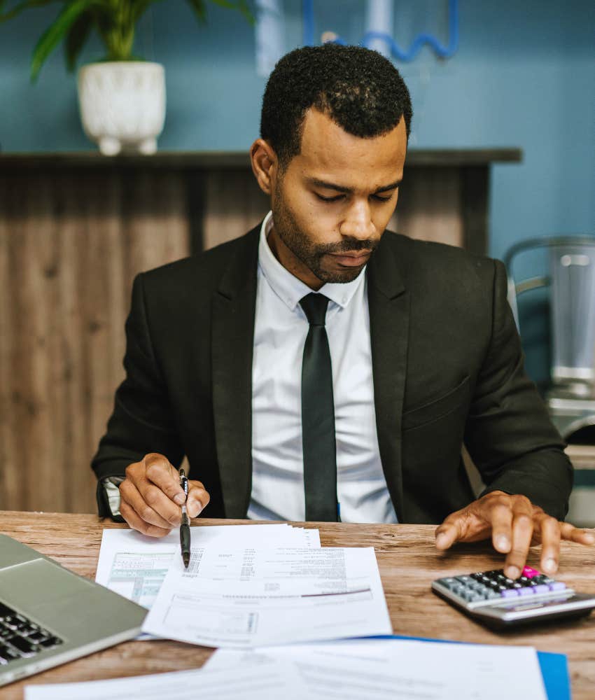 man double checking his paycheck