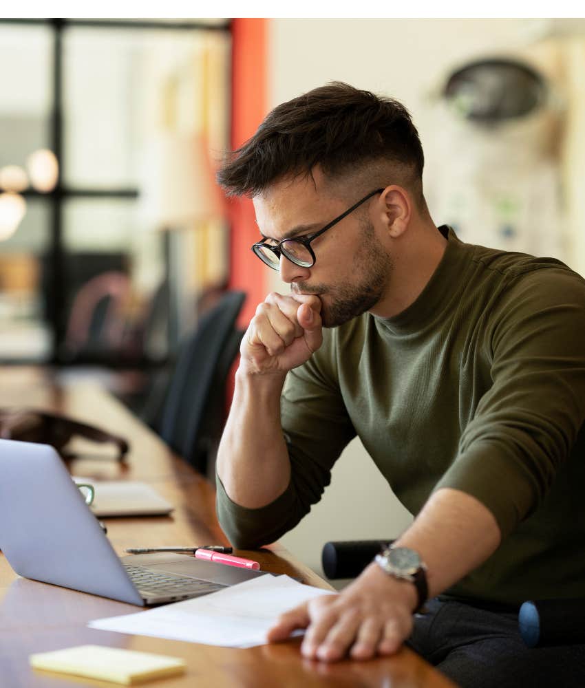 man struggling with work