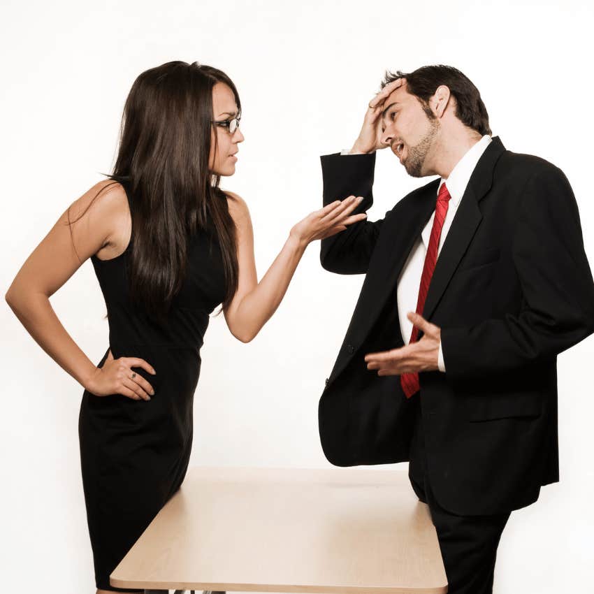 man and woman on opposite sides in heated discussion