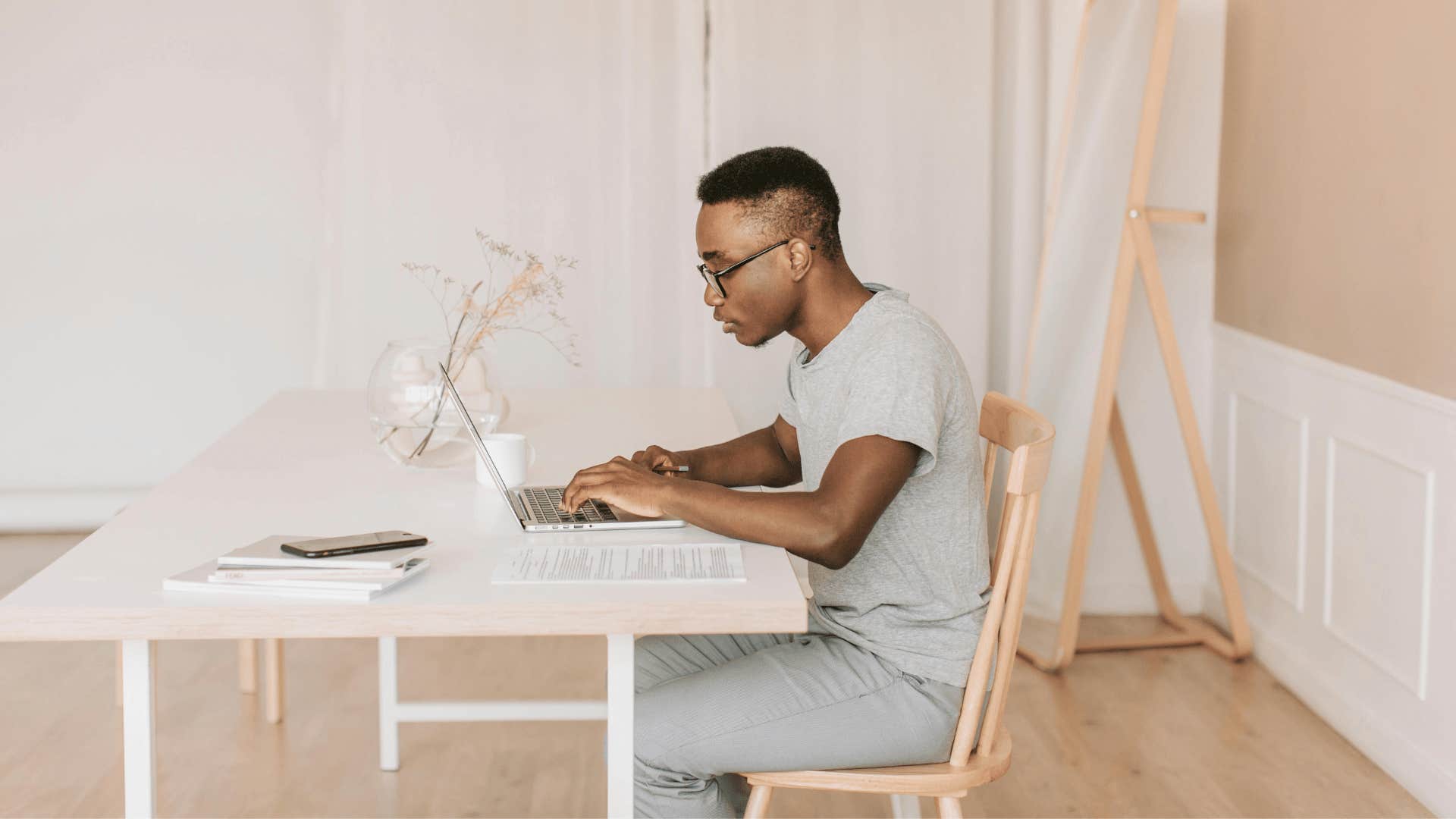 man working in a minimalist setting