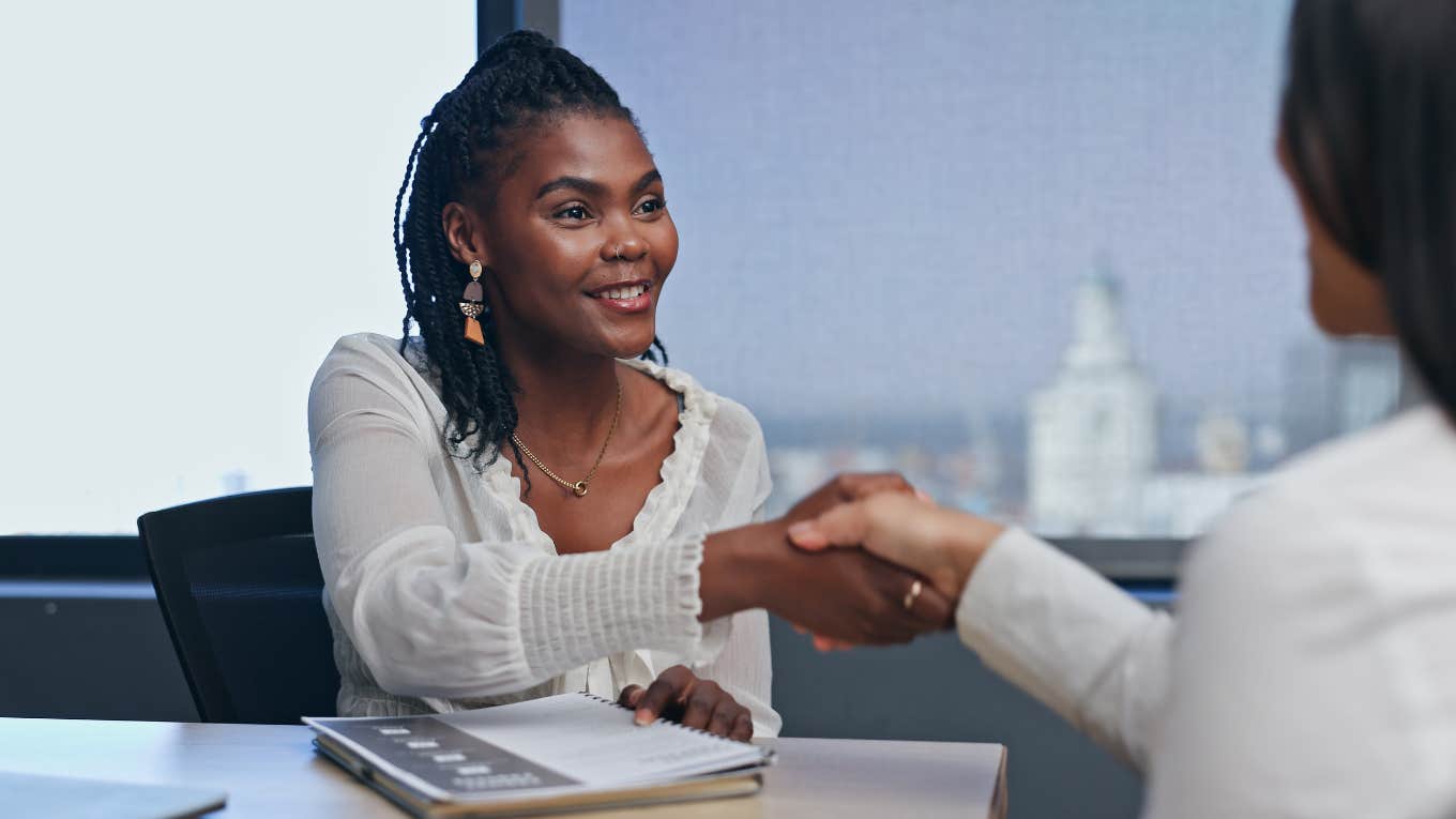 Women shaking hands during job interview