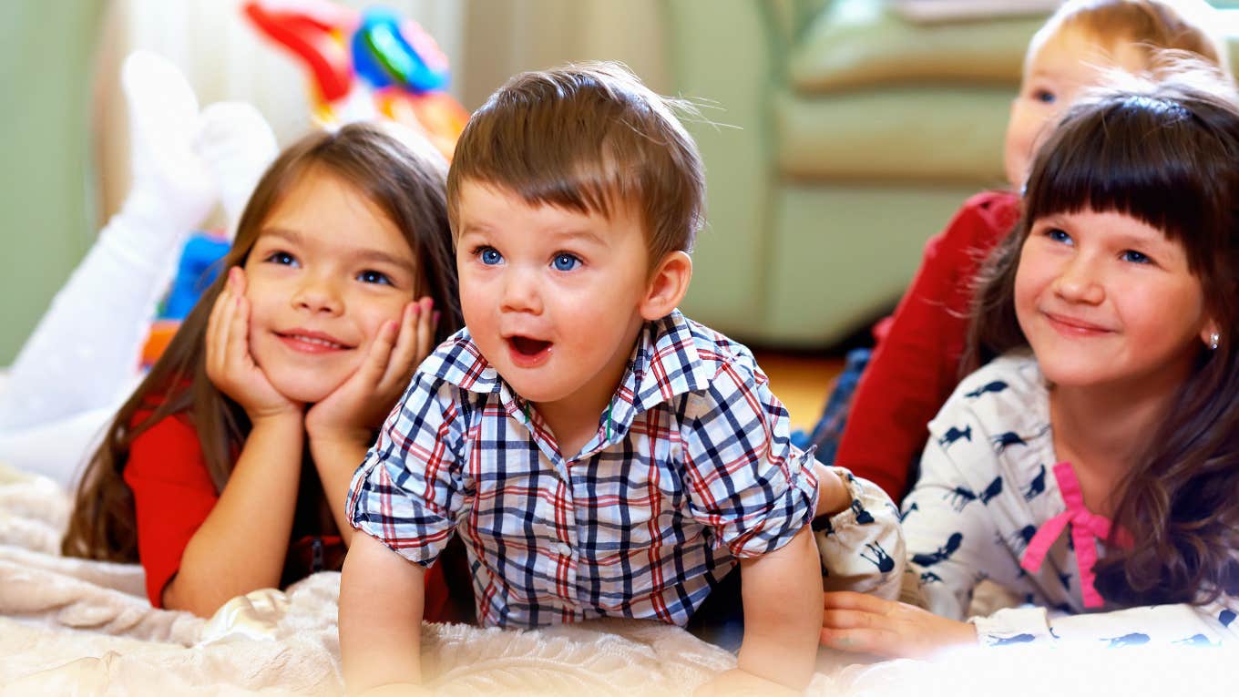 Kids at daycare watching TV