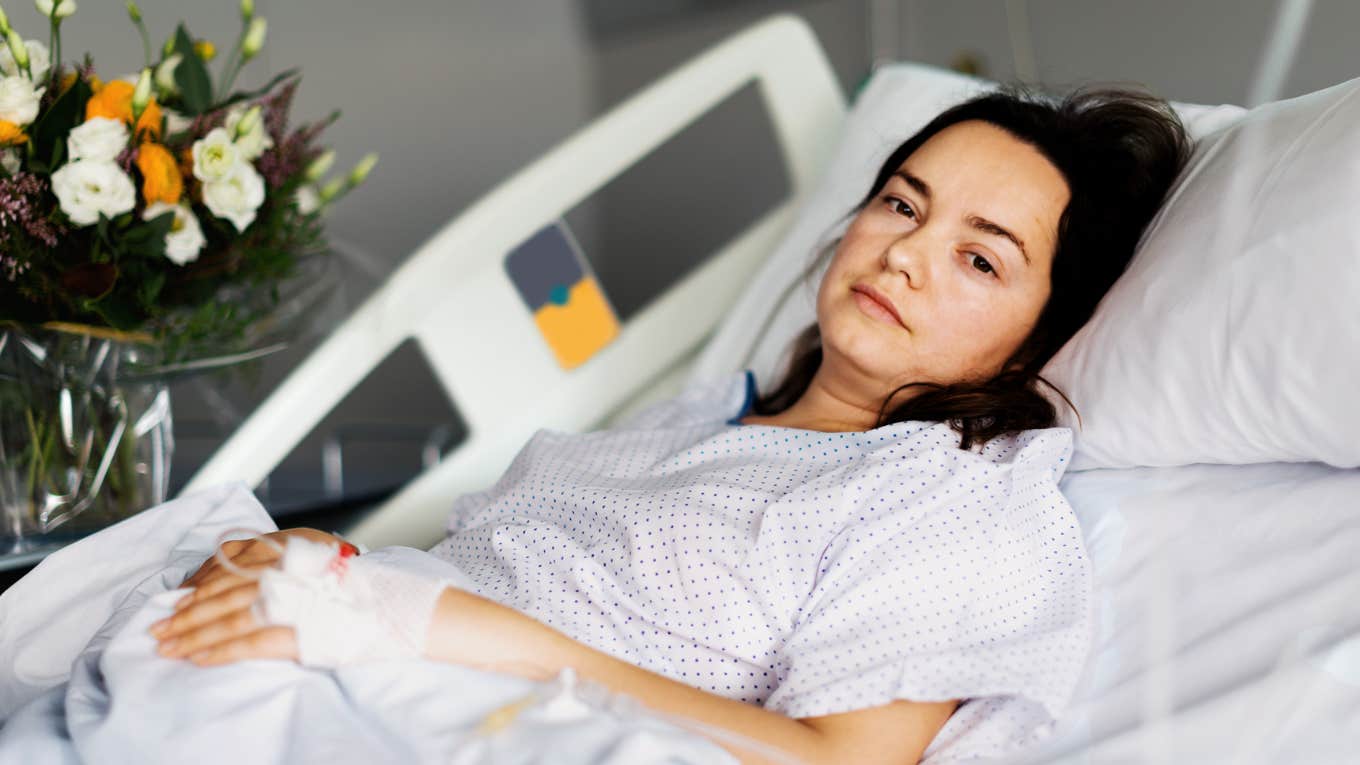 Woman in hospital bed