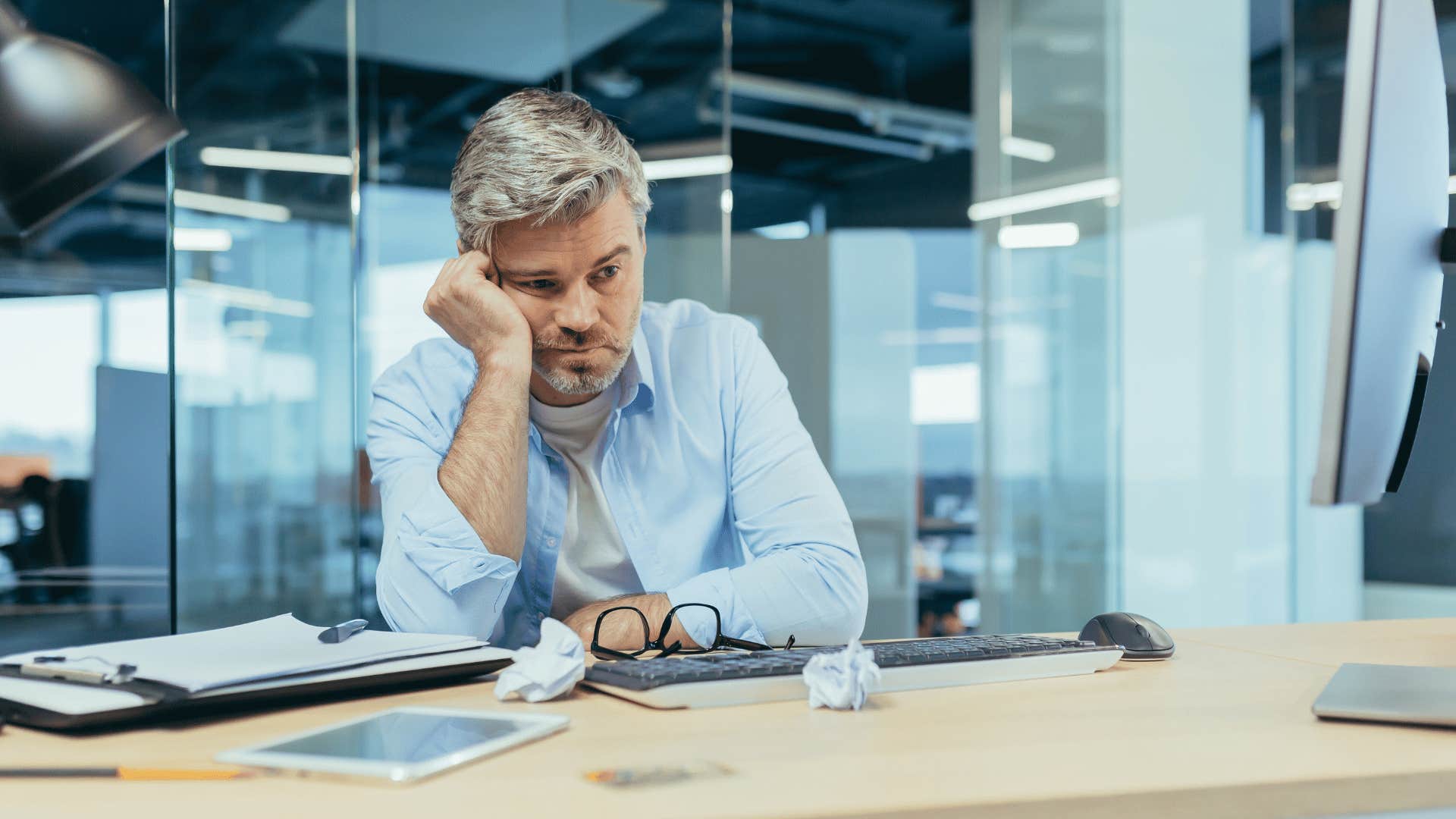 frustrated man at desk 