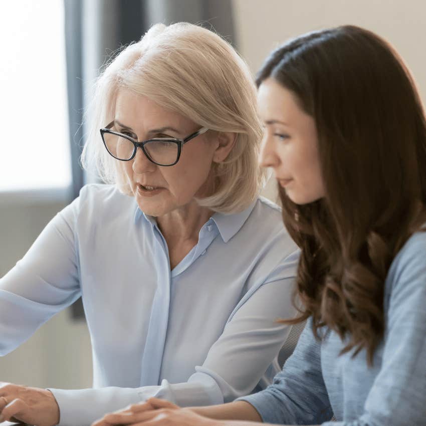 older employee mentoring younger employee