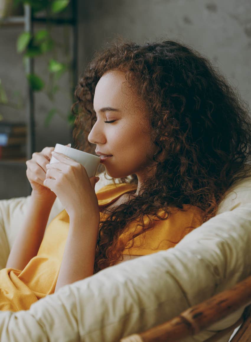 She relaxes with a cup of tea