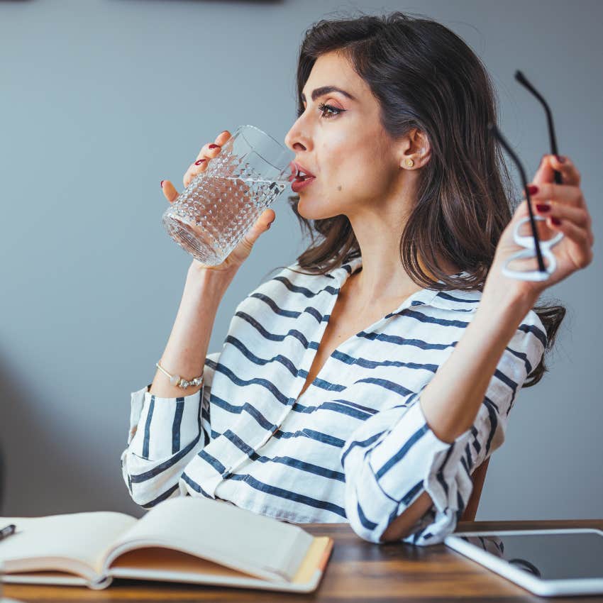 Woman drinking water as a cheat code.