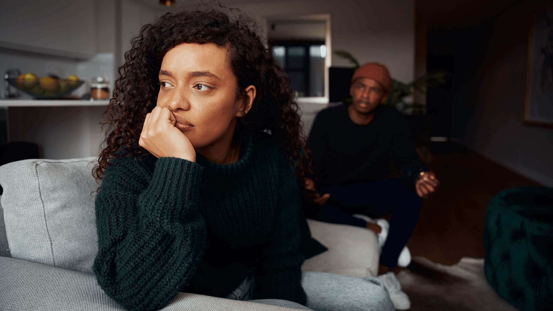 woman ignoring man while he talks 