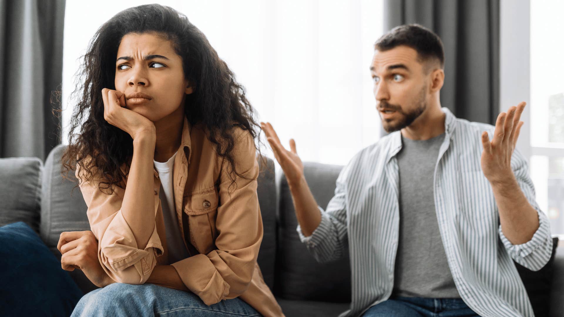 woman ignoring man while he yells 