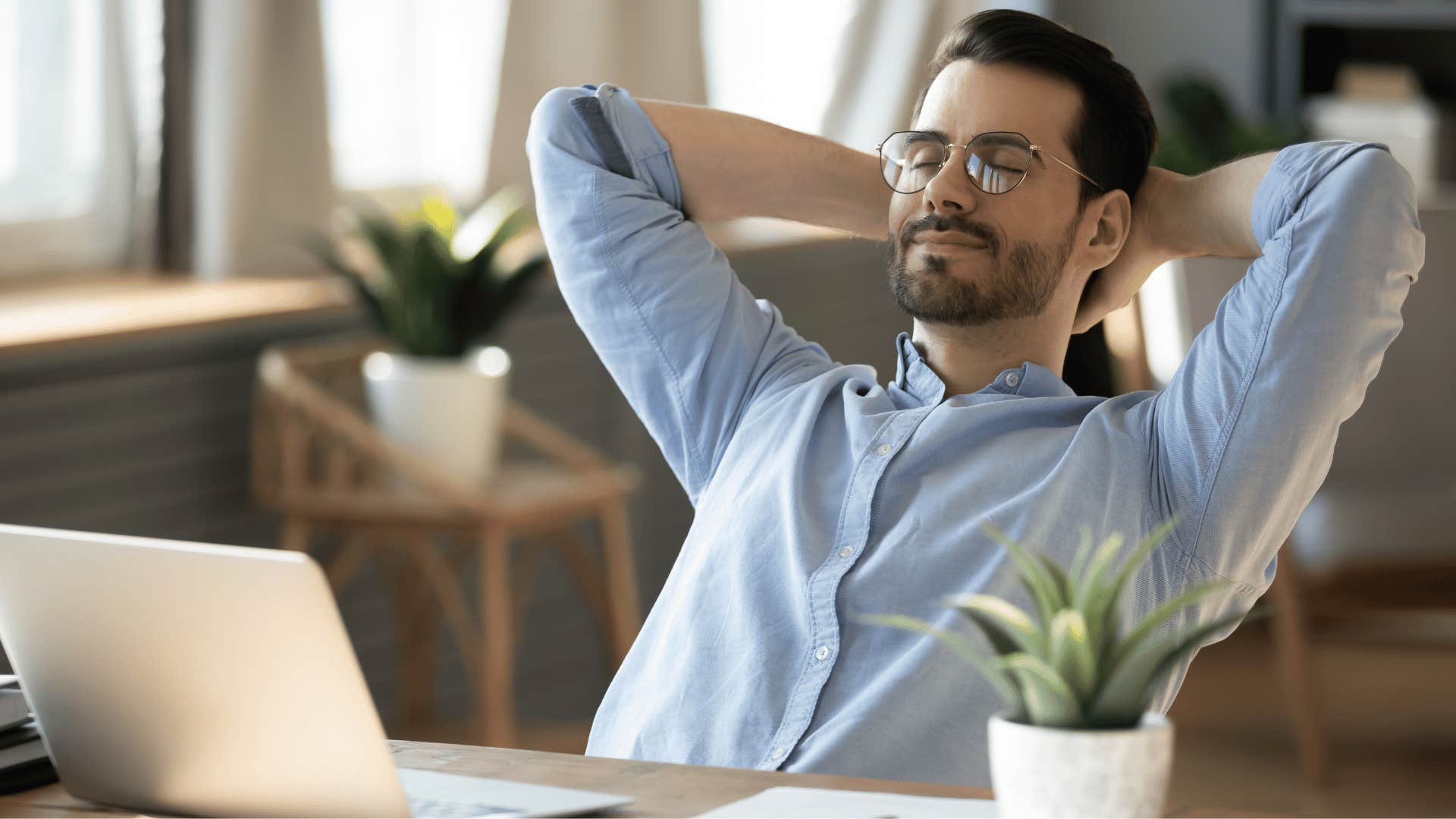 man sitting in chair relaxed