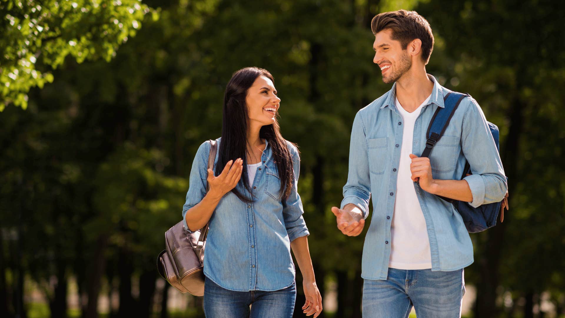 two friends walking side by side talking 