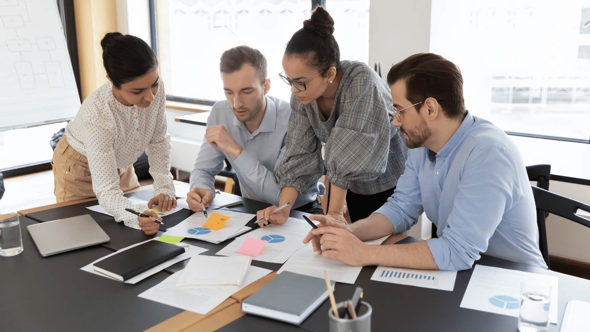 group of people discussing 