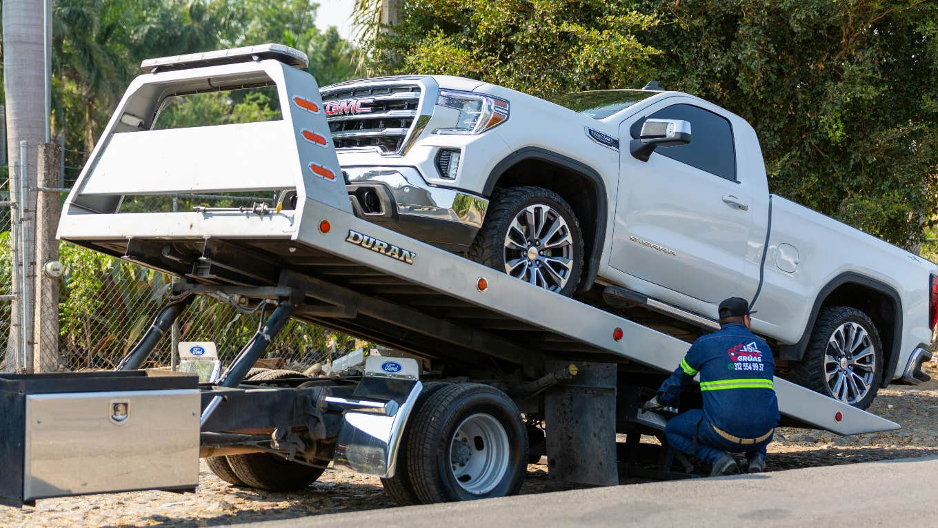 Vehicle getting towed for being illegally parked