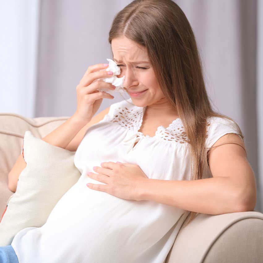 Pregnant woman crying after her husband pranked her with a terrifying childhood event