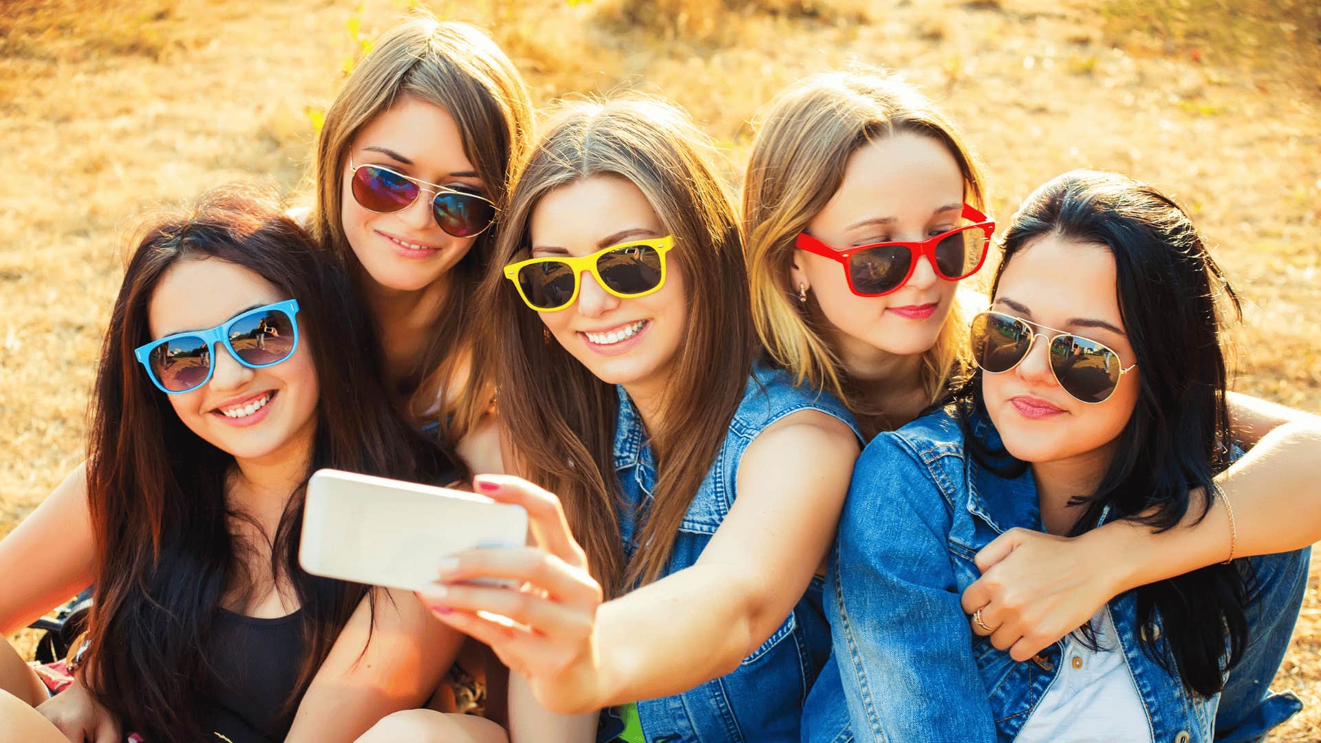 teenagers taking a selfie