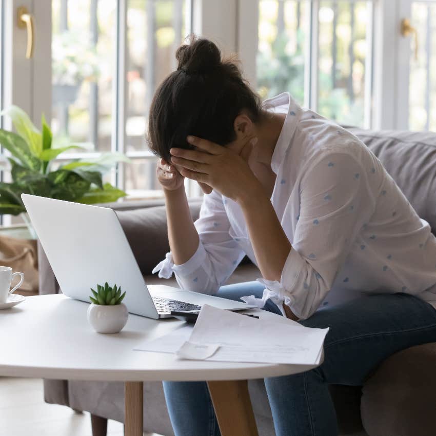 Woman doubting herself at work