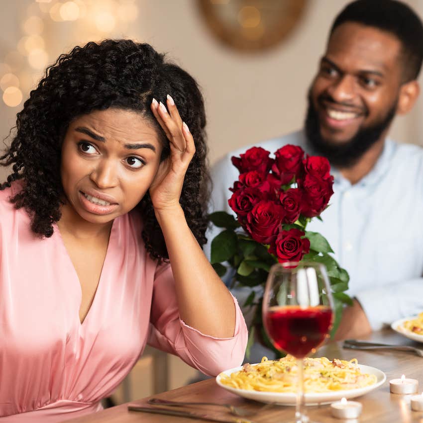 She turns away is shock at overzealous man on a date