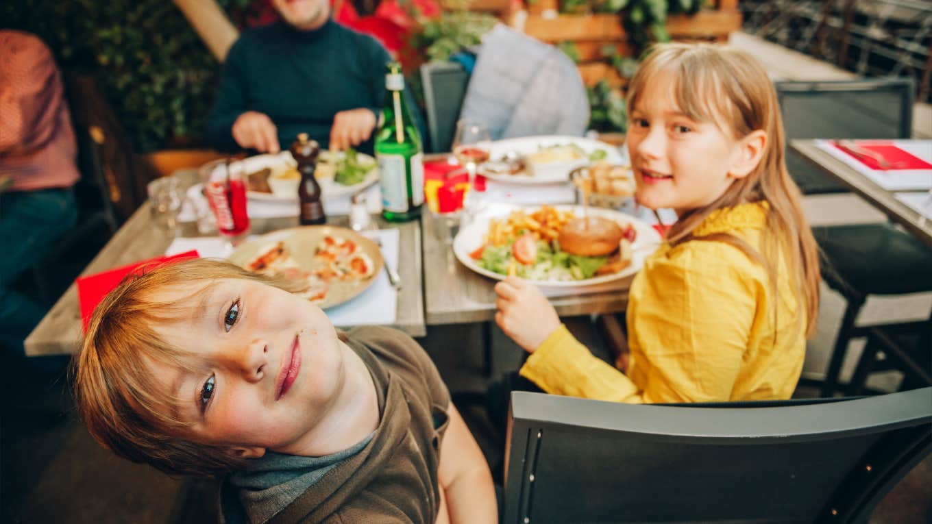 Kids at meal with expensive bill