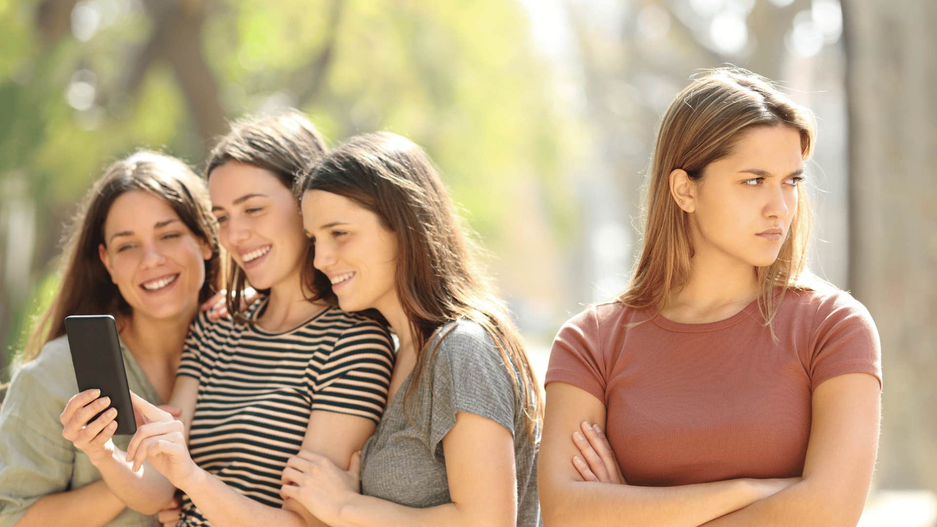 friends looking at phone