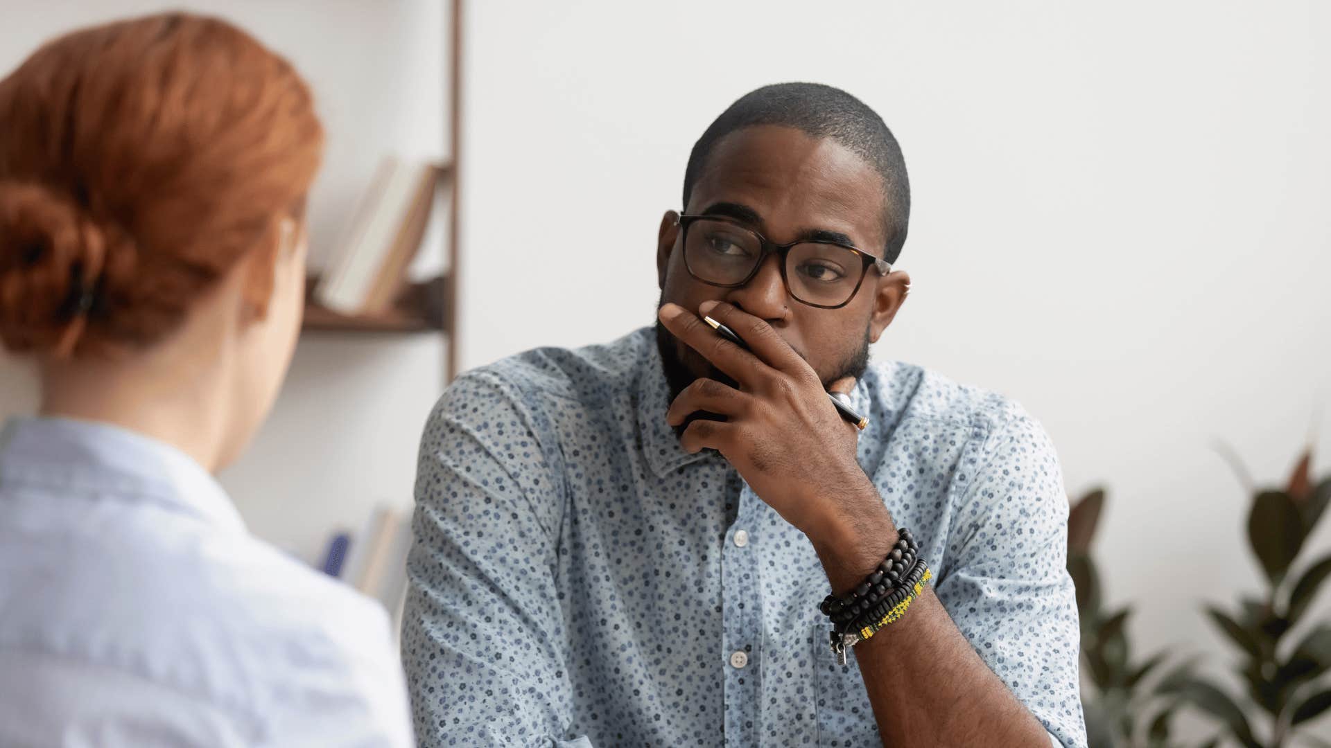 man listening thoughtfully