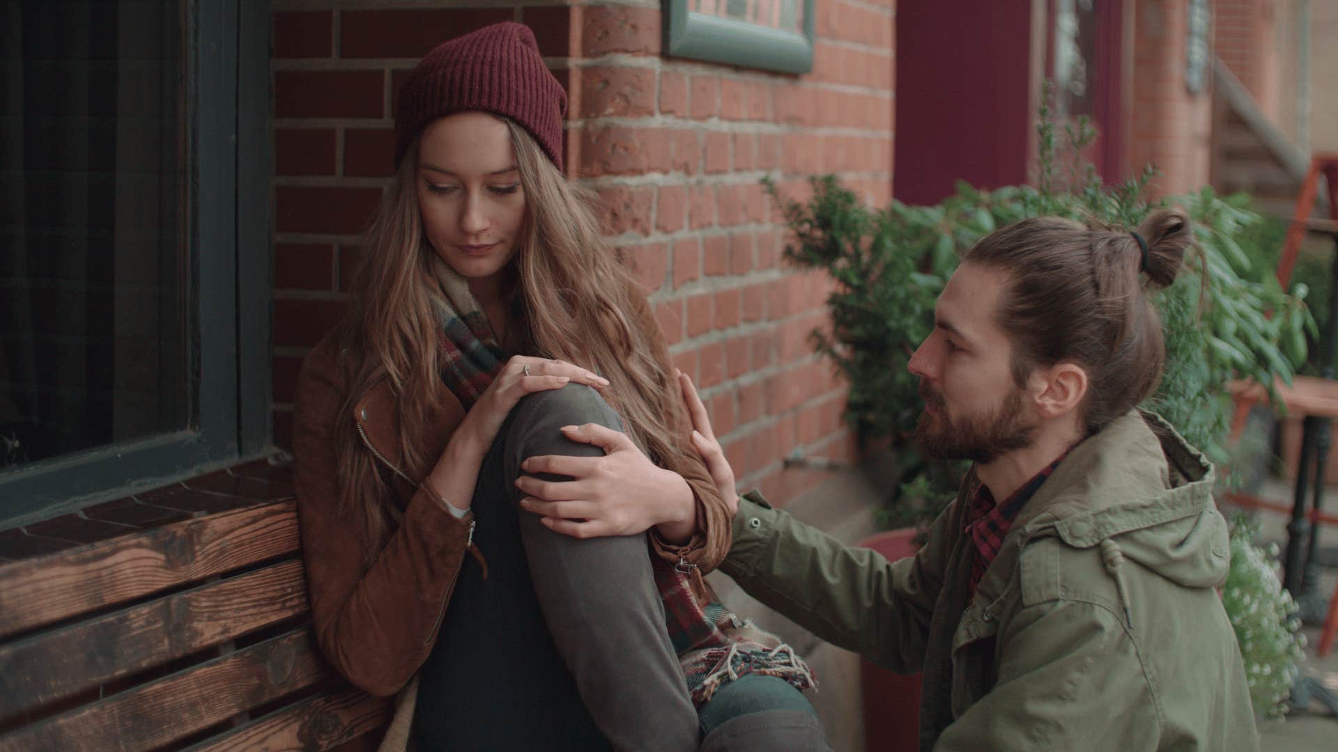 boyfriend comforting his girlfriend