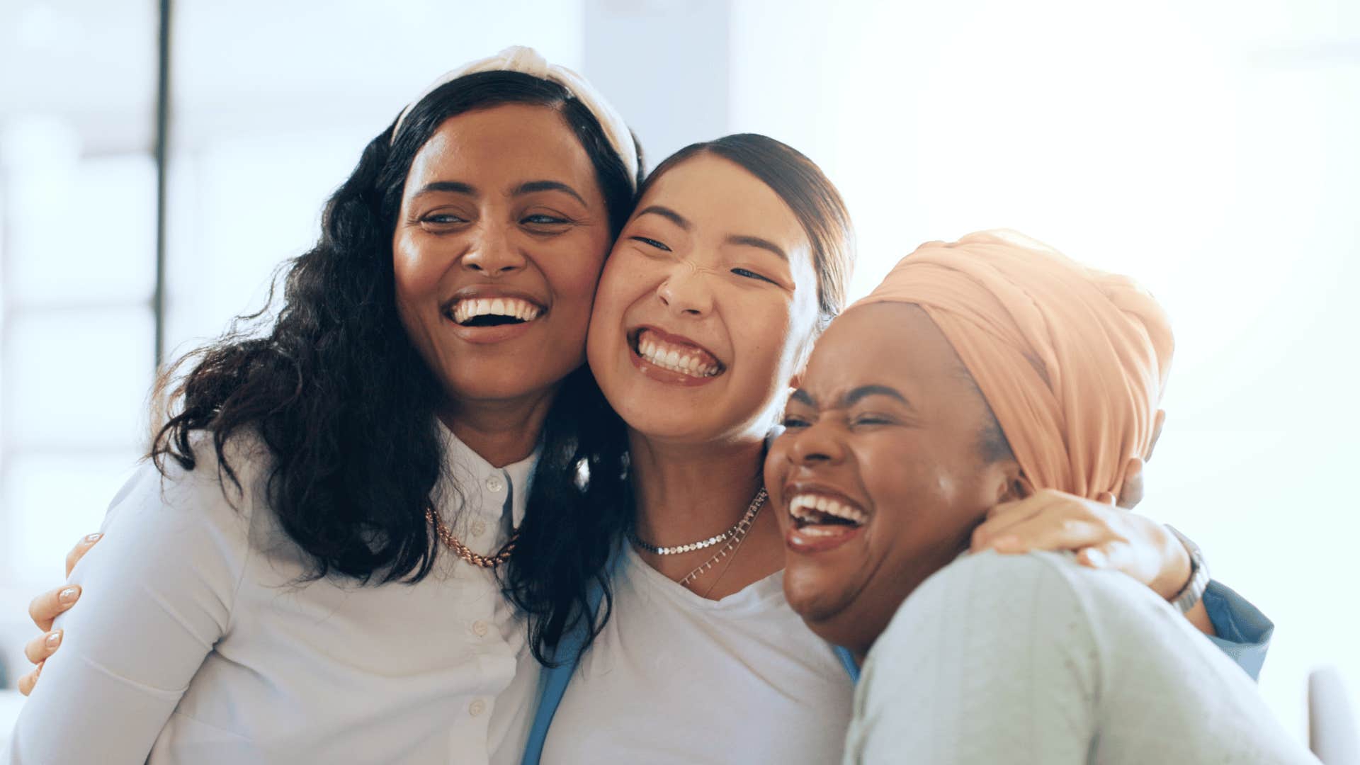 three women smiling