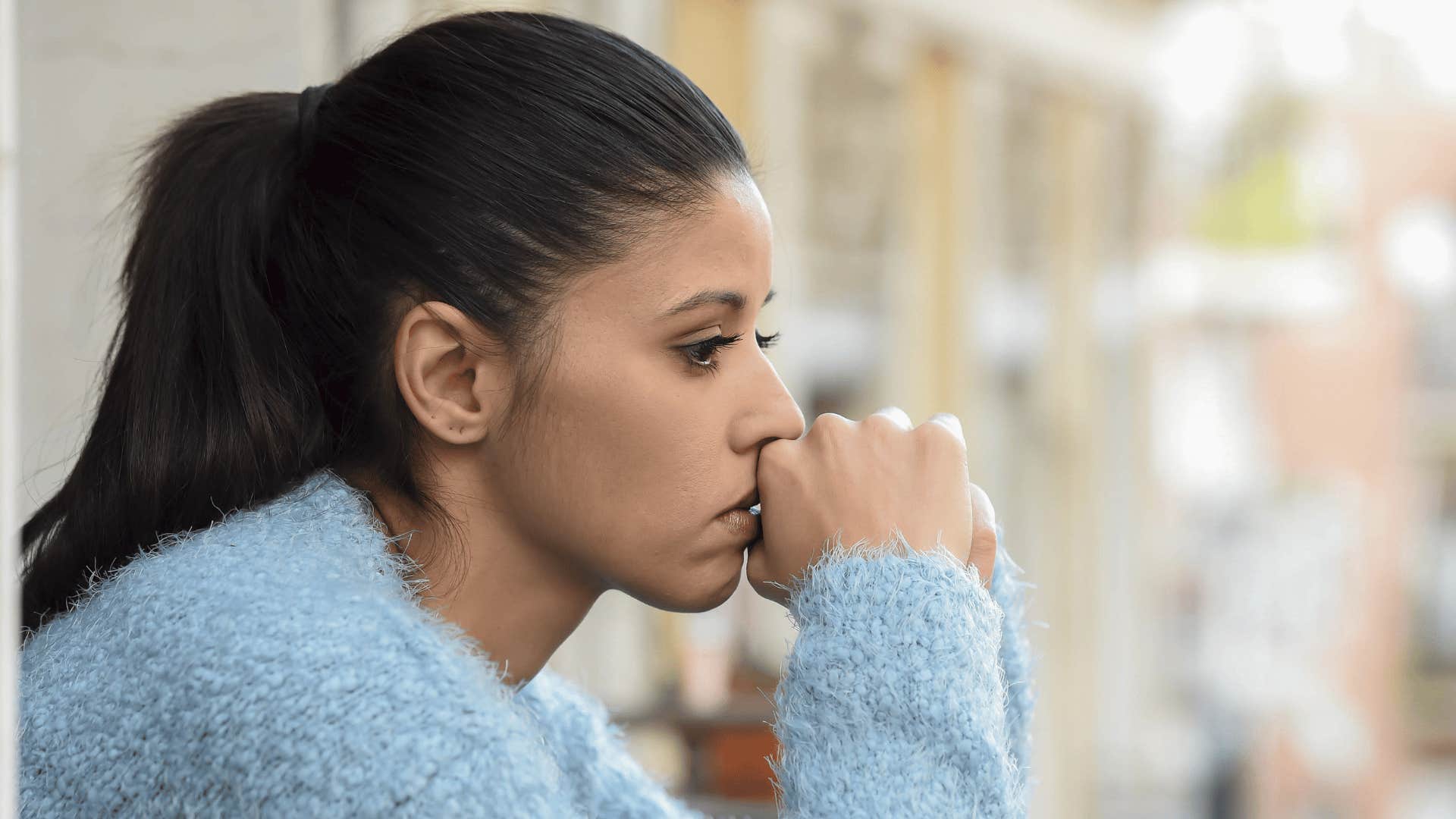 sad woman sitting alone